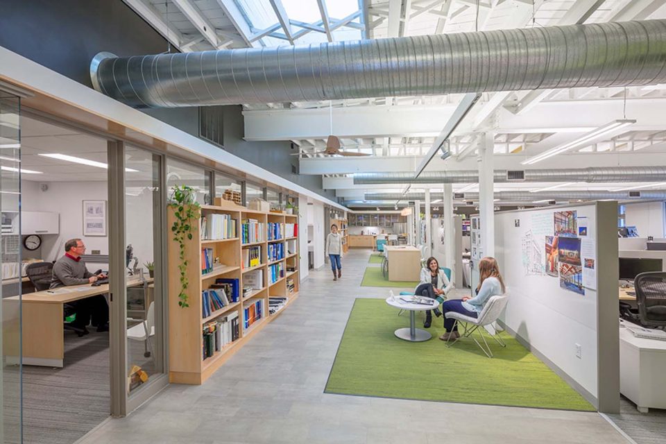 Green building with open office collaboration working spaces with natural light
