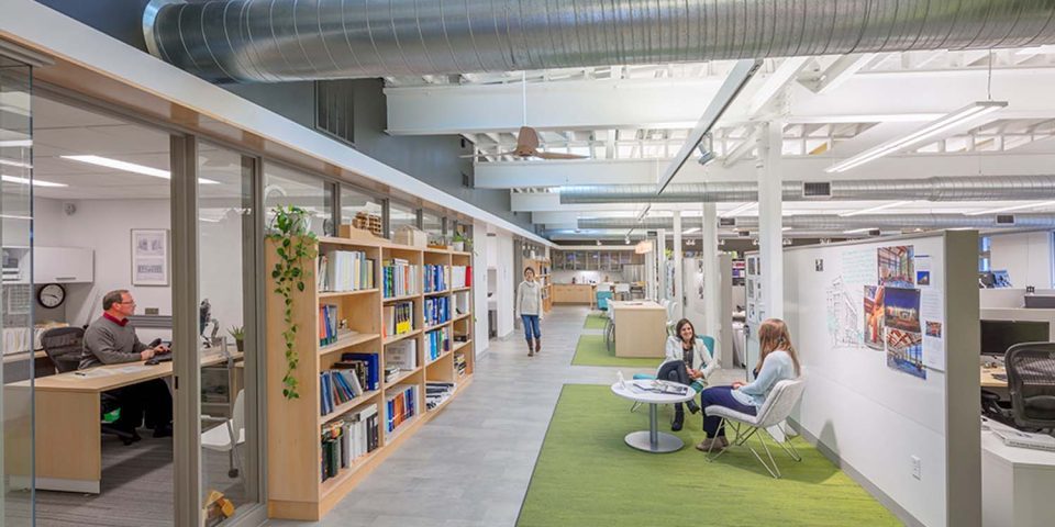 Green building with open office collaboration working spaces with natural light